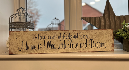 A House Is Made Of Bricks And Beams Sign